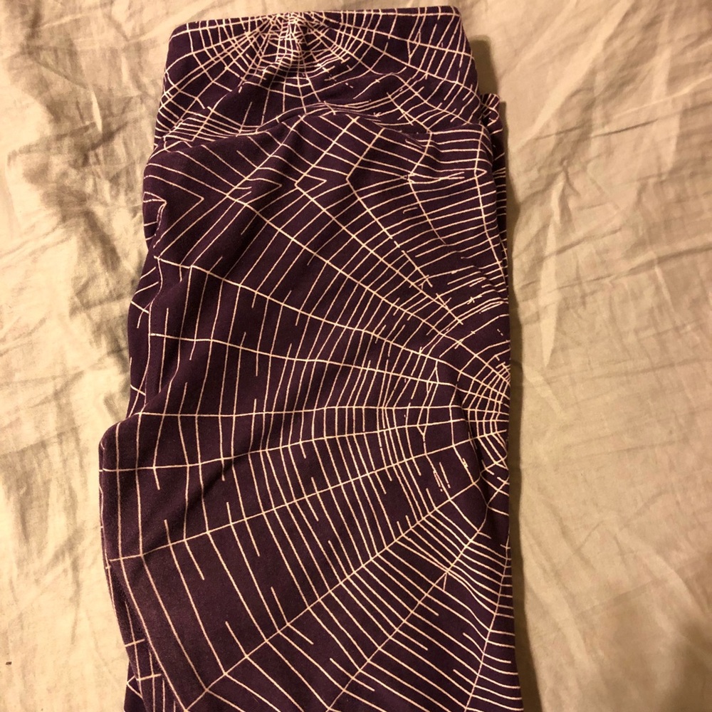 Purple spiderweb leggings